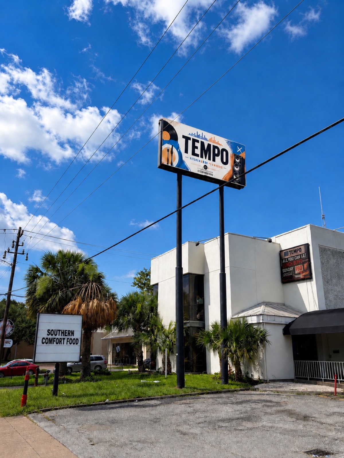 Tempo exterior sign and building at 6213 Richmond Ave in Houston